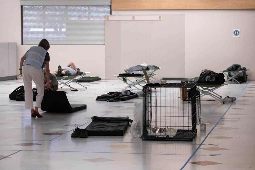 A cooling center in Multnomah County rest in a cooling center as temperatures in the Portland area exceeded 100F during a heatwave in July 2021.